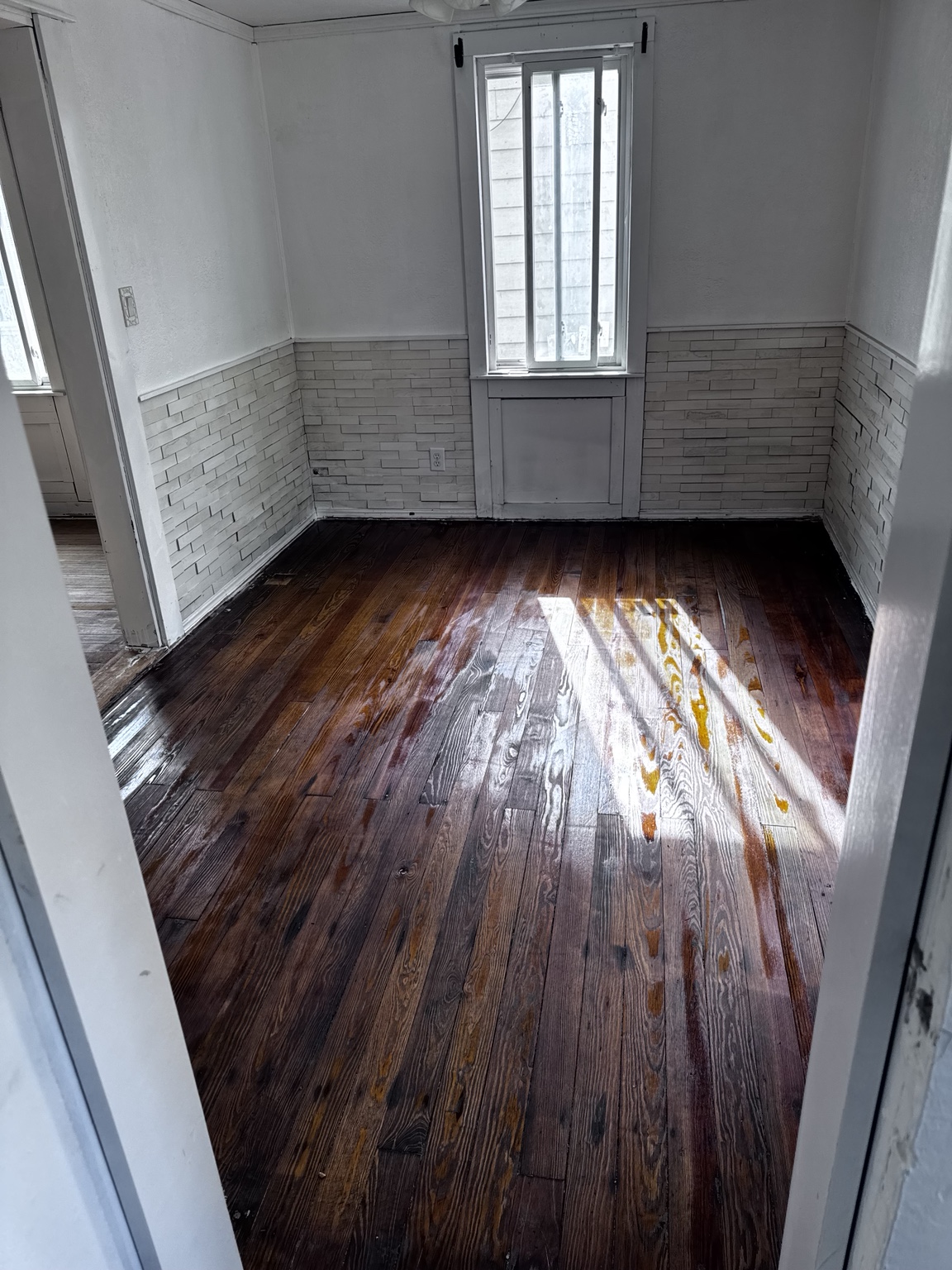 Refinished hardwood flooring by Total Home Care