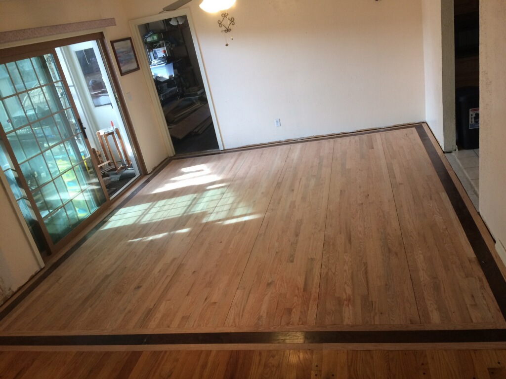 Detailed hardwood border and finish