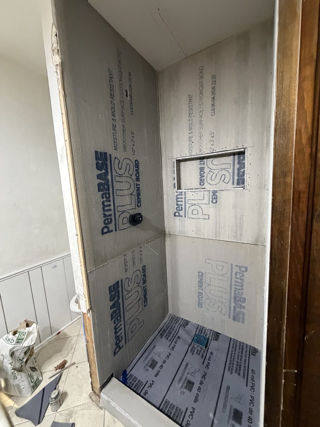 Custom shower walls prepared for waterproofing and tile