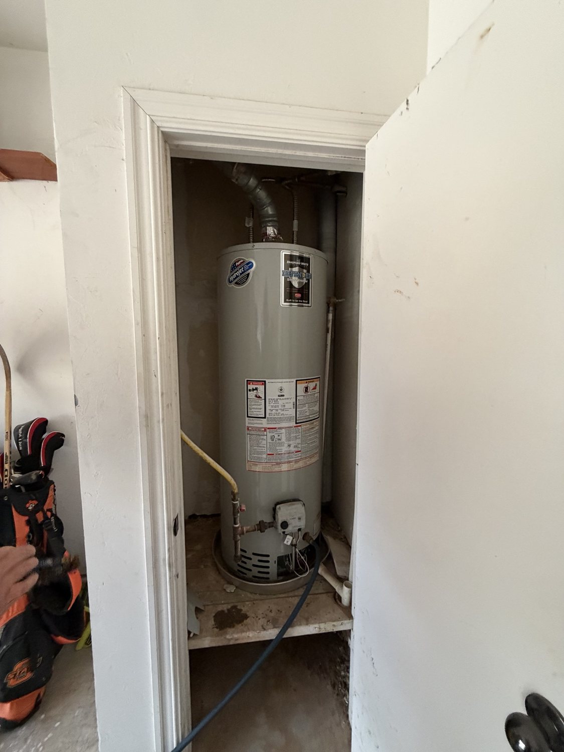Existing residential water heater before replacement